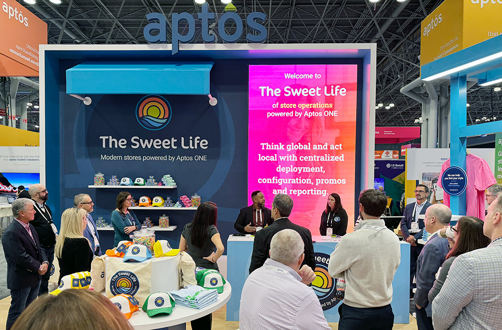 The calm before the storm: Aptos colleagues prepare to welcome visitors to The Sweet Life of the Modern Store in-booth experience before the show opened Sunday morning.